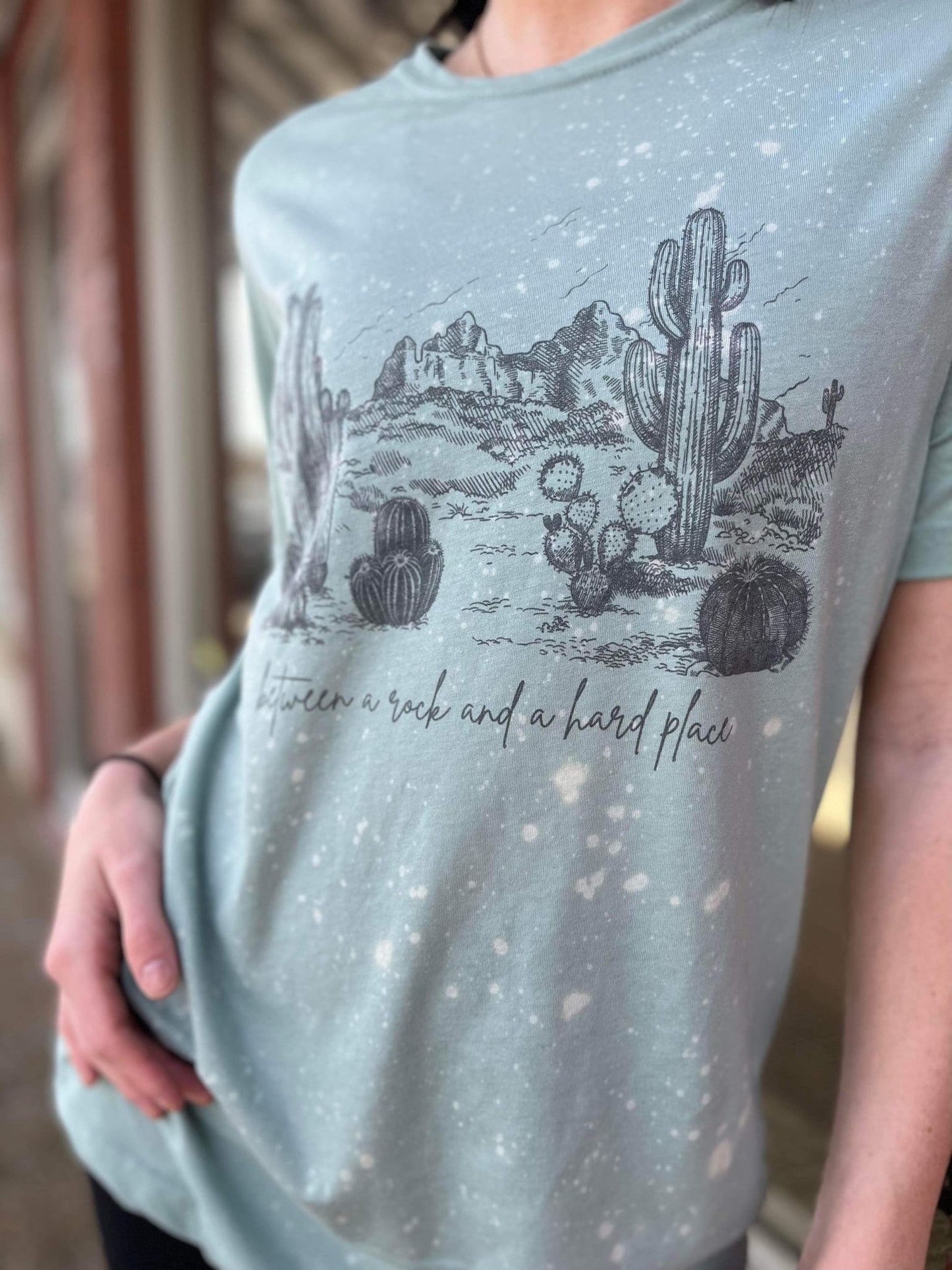 Between A Rock And A Hard Place Tee